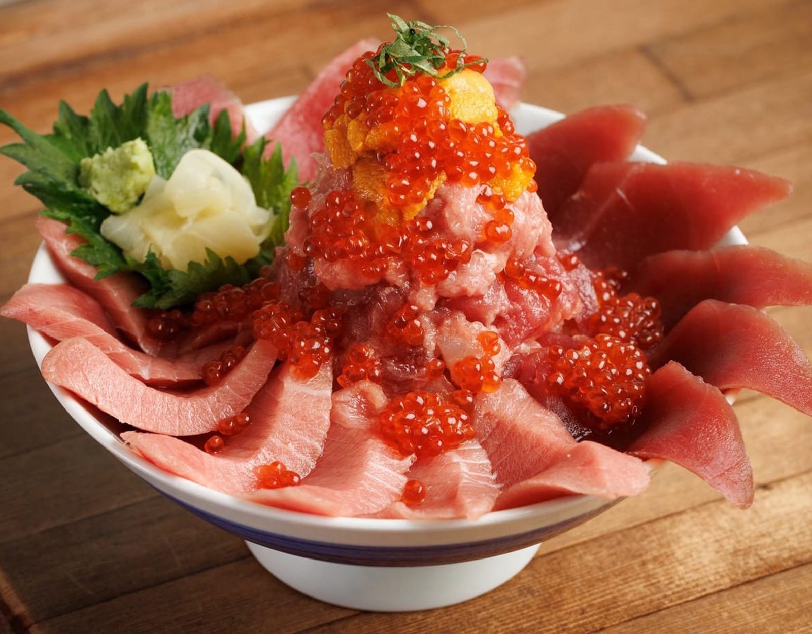 Kaisendon bowl with ikura, wasabi and pickled ginger, viewed from above